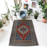 Vintage Turkish rug in a living room setting, Area rug in a living room setting, pile rug, Turkish rug, custom rug, modern rug, portland, rug shop, bright colors, wild shaman, soft rug, bold color, Portland, Oregon, rug store, rug shop, local shop