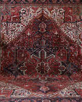 Antique Persian area rug in a living room setting, pile rug, vintage rug, portland, rug shop, bright colors, wild shaman, soft rug, bold color, Portland, Oregon, rug store, rug shop, local shop, antique rug, Persian rug, handmade rug, wool rug, distressed rug