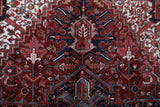 Antique Persian area rug in a living room setting, pile rug, vintage rug, portland, rug shop, bright colors, wild shaman, soft rug, bold color, Portland, Oregon, rug store, rug shop, local shop, antique rug, Persian rug, handmade rug, wool rug, distressed rug