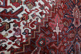 Antique Persian area rug in a living room setting, pile rug, vintage rug, portland, rug shop, bright colors, wild shaman, soft rug, bold color, Portland, Oregon, rug store, rug shop, local shop, antique rug, Persian rug, handmade rug, wool rug, distressed rug