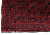 Antique Turkmen rug in a living room setting, pile rug, Turkish rug, vintage rug, portland, rug shop, bright colors, wild shaman, soft rug, bold color, Portland, Oregon, rug store, rug shop, local shop, antique rug