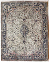 Vintage Turkish rug in a living room setting, Area rug in a living room setting, pile rug, Turkish rug, old rug, antique rug, pastel colors, faded colors, Turkish rug, vintage rug, soft rug, Portland, Oregon, rug store, rug shop, local shop, distressed rug, worn out rug