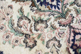 Vintage Turkish rug in a living room setting, Area rug in a living room setting, pile rug, Turkish rug, old rug, antique rug, pastel colors, faded colors, Turkish rug, vintage rug, soft rug, Portland, Oregon, rug store, rug shop, local shop, distressed rug, worn out rug