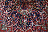 Antique Persian area rug in a living room setting, pile rug, vintage rug, portland, rug shop, bright colors, wild shaman, soft rug, bold color, Portland, Oregon, rug store, rug shop, local shop, antique rug, Persian rug, handmade rug, wool rug, distressed rug