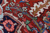 Antique Persian area rug in a living room setting, pile rug, vintage rug, portland, rug shop, bright colors, wild shaman, soft rug, bold color, Portland, Oregon, rug store, rug shop, local shop, antique rug, Persian rug, handmade rug, wool rug, distressed rug