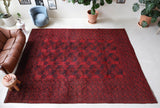 Antique Turkmen rug in a living room setting, pile rug, Turkish rug, vintage rug, portland, rug shop, bright colors, wild shaman, soft rug, bold color, Portland, Oregon, rug store, rug shop, local shop, antique rug