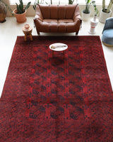 Antique Turkmen rug in a living room setting, pile rug, Turkish rug, vintage rug, portland, rug shop, bright colors, wild shaman, soft rug, bold color, Portland, Oregon, rug store, rug shop, local shop, antique rug
