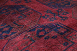 Antique Turkmen rug in a living room setting, pile rug, Turkish rug, vintage rug, portland, rug shop, bright colors, wild shaman, soft rug, bold color, Portland, Oregon, rug store, rug shop, local shop, antique rug