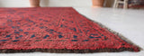 Antique Turkmen rug in a living room setting, pile rug, Turkish rug, vintage rug, portland, rug shop, bright colors, wild shaman, soft rug, bold color, Portland, Oregon, rug store, rug shop, local shop, antique rug