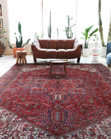Antique Persian area rug in a living room setting, pile rug, vintage rug, portland, rug shop, bright colors, wild shaman, soft rug, bold color, Portland, Oregon, rug store, rug shop, local shop, antique rug, Persian rug, handmade rug, wool rug, distressed rug