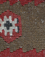 Vintage kilim rug in living room setting, old rug, antique rug, pastel colors, faded colors, Turkish rug, vintage rug, soft rug, Portland, Oregon, rug store, rug shop, local shop, earthy tones, earthy colors, warm colors