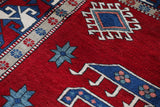 Vintage Turkish rug in a living room setting, pile rug, Turkish rug, vintage rug, portland, rug shop, bright colors, wild shaman, soft rug, bold color, Portland, Oregon, rug store, rug shop, local shop, antique rug