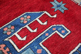 Vintage Turkish rug in a living room setting, pile rug, Turkish rug, vintage rug, portland, rug shop, bright colors, wild shaman, soft rug, bold color, Portland, Oregon, rug store, rug shop, local shop, antique rug