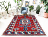 Vintage Turkish rug in a living room setting, pile rug, Turkish rug, vintage rug, portland, rug shop, bright colors, wild shaman, soft rug, bold color, Portland, Oregon, rug store, rug shop, local shop, antique rug