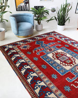 Vintage Turkish rug in a living room setting, pile rug, Turkish rug, vintage rug, portland, rug shop, bright colors, wild shaman, soft rug, bold color, Portland, Oregon, rug store, rug shop, local shop, antique rug