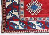 Vintage Turkish rug in a living room setting, pile rug, Turkish rug, vintage rug, portland, rug shop, bright colors, wild shaman, soft rug, bold color, Portland, Oregon, rug store, rug shop, local shop, antique rug