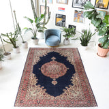 Vintage Turkish rug in a living room setting, pile rug, Turkish rug, vintage rug, portland, rug shop, bright colors, wild shaman, soft rug, bold color, Portland, Oregon, rug store, rug shop, local shop, antique rug