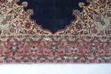 Vintage Turkish rug in a living room setting, pile rug, Turkish rug, vintage rug, portland, rug shop, bright colors, wild shaman, soft rug, bold color, Portland, Oregon, rug store, rug shop, local shop, antique rug