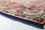Vintage Turkish rug in a living room setting, pile rug, Turkish rug, vintage rug, portland, rug shop, bright colors, wild shaman, soft rug, bold color, Portland, Oregon, rug store, rug shop, local shop, antique rug