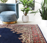 Vintage Turkish rug in a living room setting, pile rug, Turkish rug, vintage rug, portland, rug shop, bright colors, wild shaman, soft rug, bold color, Portland, Oregon, rug store, rug shop, local shop, antique rug