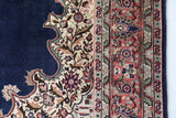Vintage Turkish rug in a living room setting, pile rug, Turkish rug, vintage rug, portland, rug shop, bright colors, wild shaman, soft rug, bold color, Portland, Oregon, rug store, rug shop, local shop, antique rug