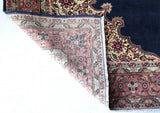 Vintage Turkish rug in a living room setting, pile rug, Turkish rug, vintage rug, portland, rug shop, bright colors, wild shaman, soft rug, bold color, Portland, Oregon, rug store, rug shop, local shop, antique rug