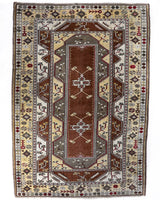 Vintage Turkish rug in living room setting, old rug, antique rug, pastel colors, faded colors, Turkish rug, vintage rug, soft rug, Portland, Oregon, rug store, rug shop, local shop