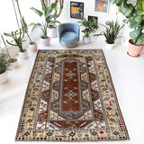 Vintage Turkish rug in living room setting, old rug, antique rug, pastel colors, faded colors, Turkish rug, vintage rug, soft rug, Portland, Oregon, rug store, rug shop, local shop