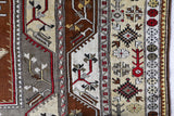 Vintage Turkish rug in living room setting, old rug, antique rug, pastel colors, faded colors, Turkish rug, vintage rug, soft rug, Portland, Oregon, rug store, rug shop, local shop