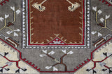Vintage Turkish rug in living room setting, old rug, antique rug, pastel colors, faded colors, Turkish rug, vintage rug, soft rug, Portland, Oregon, rug store, rug shop, local shop