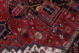 Antique Persian area rug in a living room setting, pile rug, vintage rug, portland, rug shop, bright colors, wild shaman, soft rug, bold color, Portland, Oregon, rug store, rug shop, local shop, antique rug, Persian rug, handmade rug, wool rug, distressed rug