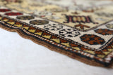 Vintage Turkish rug in living room setting, old rug, antique rug, pastel colors, faded colors, Turkish rug, vintage rug, soft rug, Portland, Oregon, rug store, rug shop, local shop