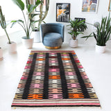 Vintage kilim rug in living room setting, bright colors, wild shaman, soft rug, bold color, Portland, Oregon, rug store, rug shop, local shop, vintage rug, modern kilim, warm colors