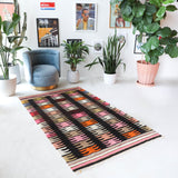 Vintage kilim rug in living room setting, bright colors, wild shaman, soft rug, bold color, Portland, Oregon, rug store, rug shop, local shop, vintage rug, modern kilim, warm colors