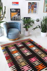 Vintage kilim rug in living room setting, bright colors, wild shaman, soft rug, bold color, Portland, Oregon, rug store, rug shop, local shop, vintage rug, modern kilim, warm colors