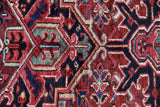 Antique Persian area rug in a living room setting, pile rug, vintage rug, portland, rug shop, bright colors, wild shaman, soft rug, bold color, Portland, Oregon, rug store, rug shop, local shop, antique rug, Persian rug, handmade rug, wool rug, distressed rug