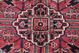 Antique Persian area rug in a living room setting, pile rug, vintage rug, portland, rug shop, bright colors, wild shaman, soft rug, bold color, Portland, Oregon, rug store, rug shop, local shop, antique rug, Persian rug, handmade rug, wool rug, distressed rug