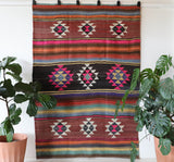 Vintage kilim rug in living room setting, bright colors, wild shaman, soft rug, bold color, Portland, Oregon, rug store, rug shop, local shop, vintage rug, modern kilim, warm colors