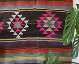 Vintage kilim rug in living room setting, bright colors, wild shaman, soft rug, bold color, Portland, Oregon, rug store, rug shop, local shop, vintage rug, modern kilim, warm colors