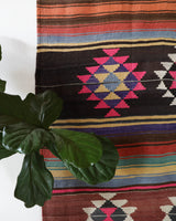 Vintage kilim rug in living room setting, bright colors, wild shaman, soft rug, bold color, Portland, Oregon, rug store, rug shop, local shop, vintage rug, modern kilim, warm colors