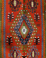 Vintage kilim rug in living room setting, bright colors, wild shaman, soft rug, bold color, Portland, Oregon, rug store, rug shop, local shop, vintage rug, modern kilim, warm colors