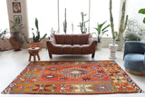 Vintage kilim rug in living room setting, bright colors, wild shaman, soft rug, bold color, Portland, Oregon, rug store, rug shop, local shop, vintage rug, modern kilim, warm colors