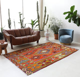Vintage kilim rug in living room setting, bright colors, wild shaman, soft rug, bold color, Portland, Oregon, rug store, rug shop, local shop, vintage rug, modern kilim, warm colors