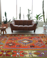 Vintage kilim rug in living room setting, bright colors, wild shaman, soft rug, bold color, Portland, Oregon, rug store, rug shop, local shop, vintage rug, modern kilim, warm colors