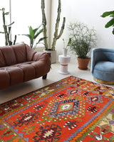 Vintage kilim rug in living room setting, bright colors, wild shaman, soft rug, bold color, Portland, Oregon, rug store, rug shop, local shop, vintage rug, modern kilim, warm colors