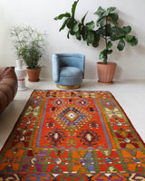 Vintage kilim rug in living room setting, bright colors, wild shaman, soft rug, bold color, Portland, Oregon, rug store, rug shop, local shop, vintage rug, modern kilim, warm colors