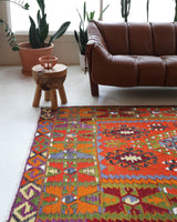 Vintage kilim rug in living room setting, bright colors, wild shaman, soft rug, bold color, Portland, Oregon, rug store, rug shop, local shop, vintage rug, modern kilim, warm colors