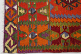 Vintage kilim rug in living room setting, bright colors, wild shaman, soft rug, bold color, Portland, Oregon, rug store, rug shop, local shop, vintage rug, modern kilim, warm colors