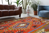 Vintage kilim rug in living room setting, bright colors, wild shaman, soft rug, bold color, Portland, Oregon, rug store, rug shop, local shop, vintage rug, modern kilim, warm colors