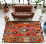 Vintage kilim rug in living room setting, bright colors, wild shaman, soft rug, bold color, Portland, Oregon, rug store, rug shop, local shop, vintage rug, modern kilim, warm colors